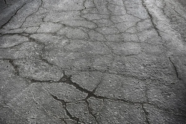 asfalt yolda çatlaklar doku / soyut arka plan çatlakları asfalt asfalt