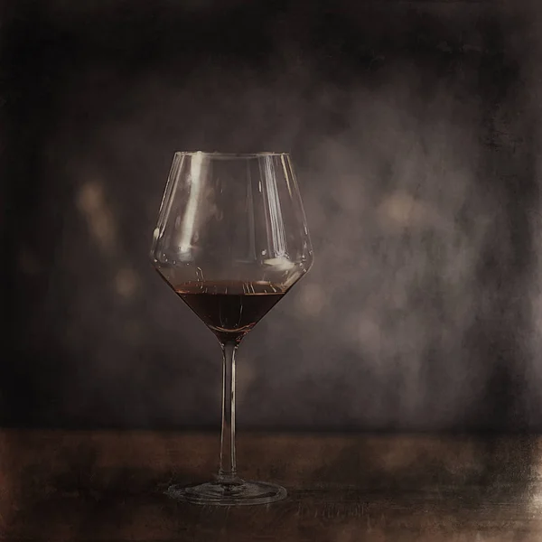 glass of red wine / vintage background, old cask wine, alcohol tasting