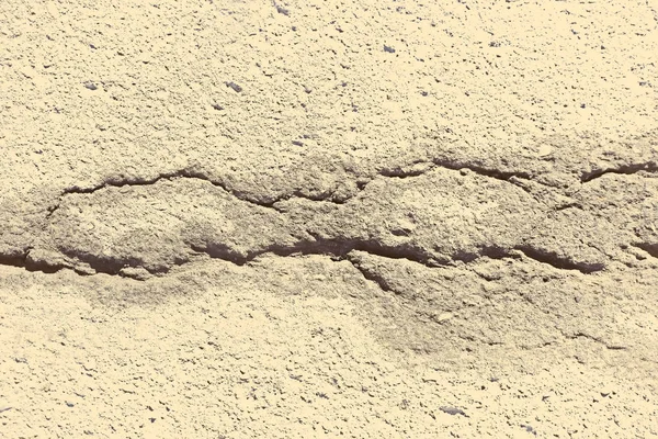 亀裂の質感のアスファルト アスファルト道路の抽象的な背景亀裂 — ストック写真
