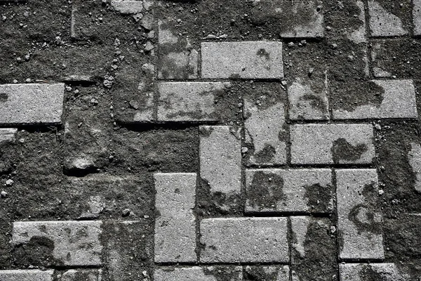 old stone pavement background / abstract pavement, large cobblestones, old road texture