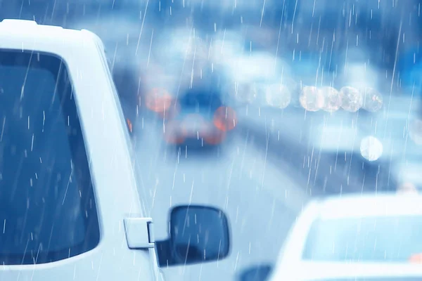 rain road traffic jam / abstract background raindrops in the city on the highway, cars stress autumn