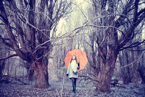 young woman umbrella autumn / autumn trendy look, model with umbrella, rainy cold weather