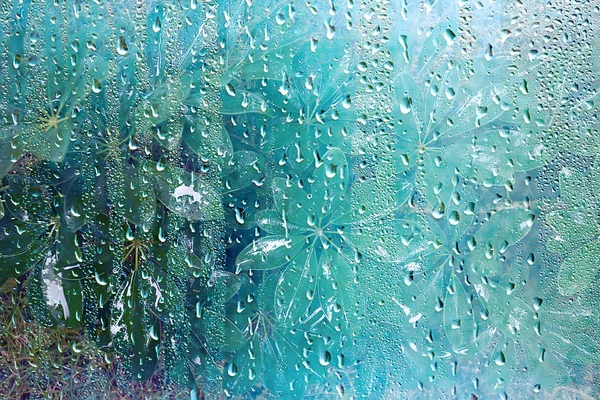 夏の雨濡れガラス 窓の外の雨の日に抽象的な背景風景ぼやけた背景 — ストック写真