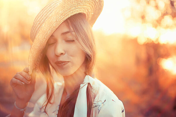 golden autumn girl portrait / happy free young girl in autumn landscape, indian summer view
