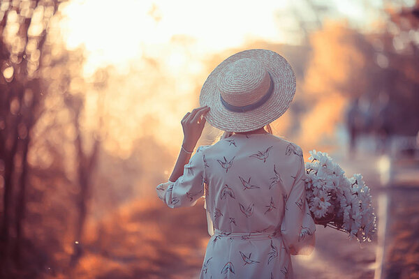 happy romantic girl in a straw hat / young model in a dress summer day, happiness woman