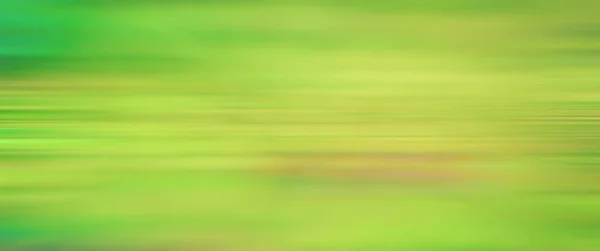 抽象的なぼやけた背景の動き緑の色季節の夏のぼやけた葉自然 — ストック写真
