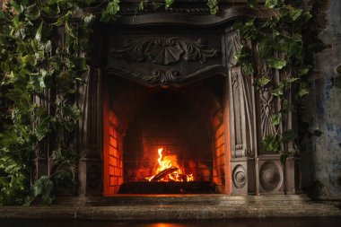 Şömine yanıyor. Şömine, mobilya olarak kullanılacak.