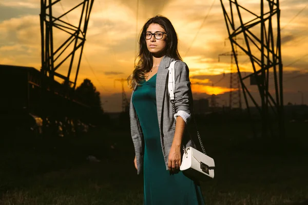 Beautiful young woman smiling cheerful walking in the street on sunset, casual pretty girl at the town — Stock Photo, Image