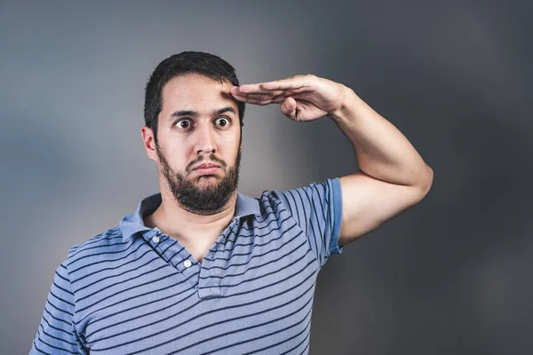 young man doing military salute