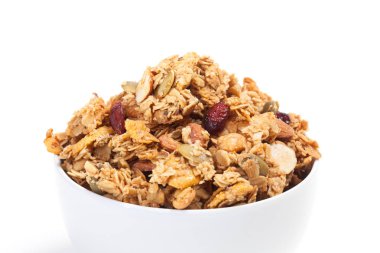 Granola beyaz kupa beyaz arka plan üzerinde izole kapatmak.