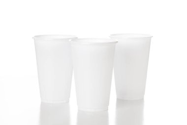 Empty white plastic cup isolated on white background