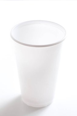 Empty white plastic cup isolated on white background