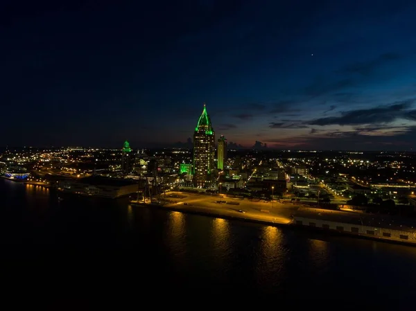 Downtown Mobile, Alabama riverside at night 