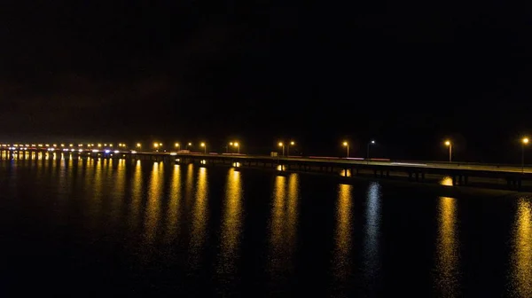 Interstate 10 eastbound bridge on Mobile Bay, Alabama at night