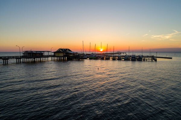 Fairhope pier on Mobile Bay, Alabama at sunset 