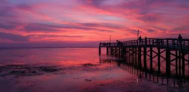 Mobile Bay at sunset on the Alabama Gulf Coast in August 2020 clipart