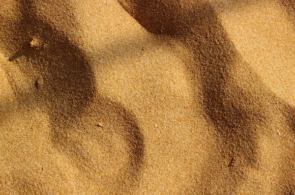 Textura de areia e fundo — Fotografia de Stock