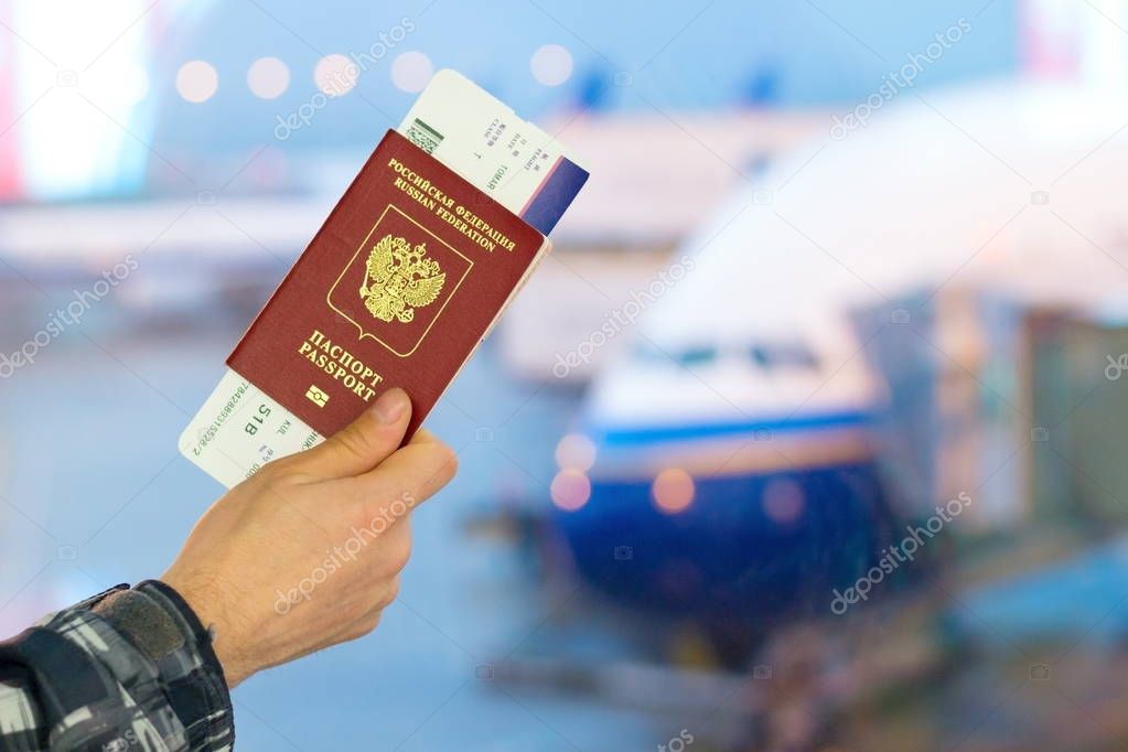 Passport and ticket in hand in airport