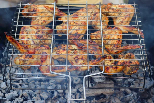 Chicken wings on grill — Stock Photo, Image