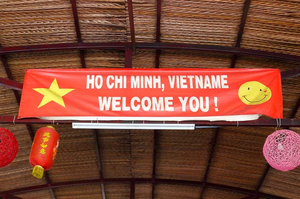 Willkommen in ho chi minh, vietnam — Stockfoto