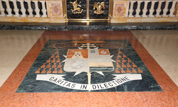 Manila, Philippines - September 24, 2018: coat of arms and inscription on stone floor in the Minor Basilica and Metropolitan Cathedral of the Immaculate Conception or Manila Cathedral