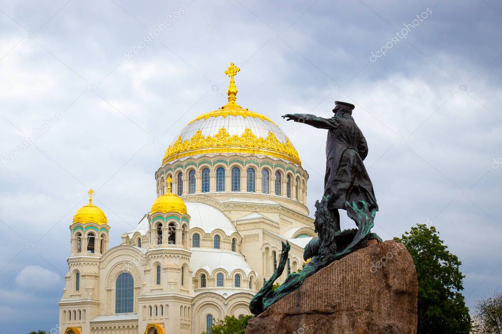 Monument to Vice-Admiral S.O. Makarov against the background of the Naval Cathedral in Kronstadt, Russia. Church and monument erected in 1913.