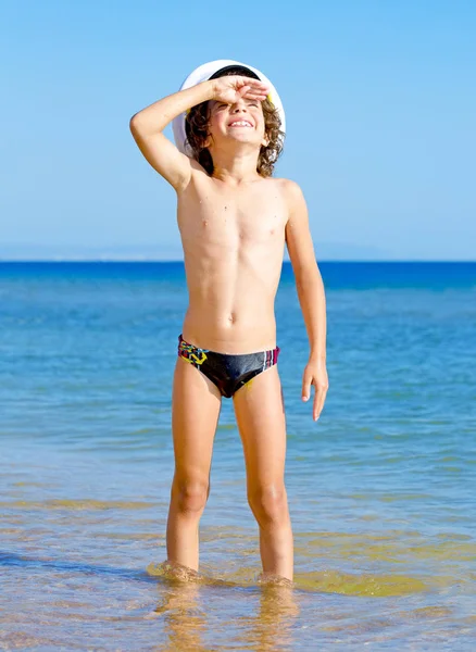 Funny Child Black Swimming Trunks Sea Cap Looking Distance Background Stock Photo