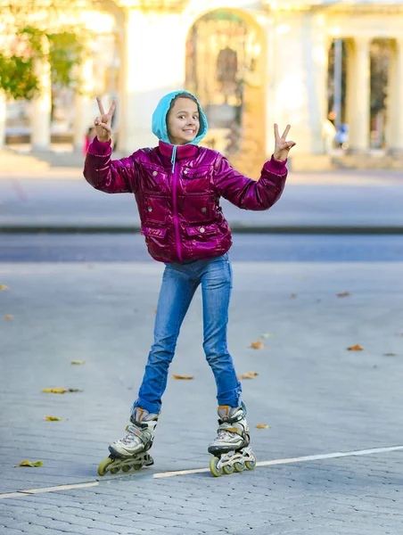 Teenage Girl Red Jacket Roller Skating Street Showing Victory Gesture — Stock Photo, Image
