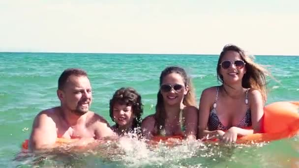 Slow Motion Family Orange Mattress Having Fun Sea Daytime — Stock Video