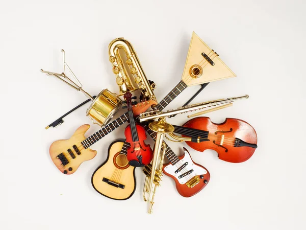 Musical Instruments Mini Models Toys Souvenirs Light Background — Stock Photo, Image