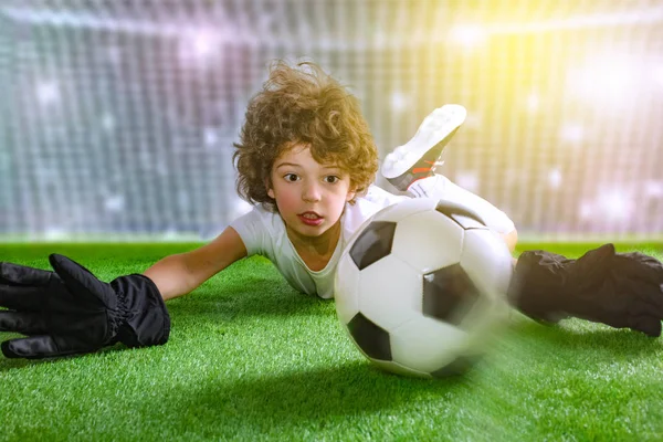 Niño futbol de stock, imágenes Niño portero futbol sin royalties | Depositphotos