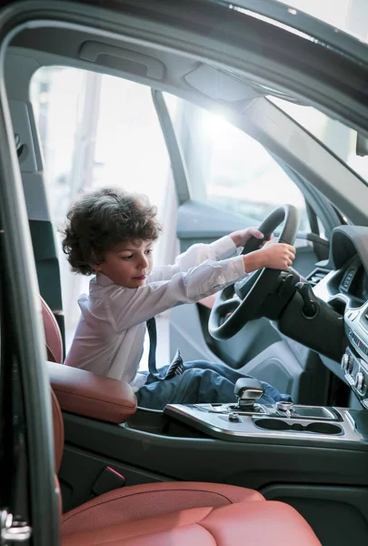 Child Observing Testing New Car Dealership Little Boy Sitting Driver — Stock Photo, Image