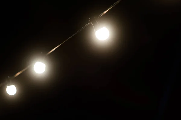 Row of street lights in the night