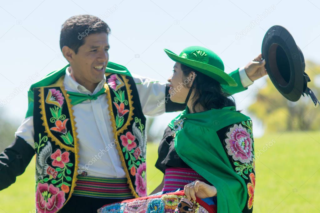 Peruvian couple dancing Huayno, a traditional musical genre typical of the Andean region of Peru, Bolivia, northern Argentina and northern Chile