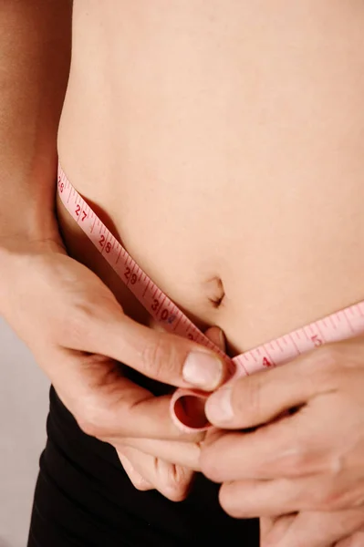 Woman Measuring Waist Using Tape Measure — Stock Photo, Image