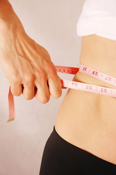 Woman Measuring Waist Using Tape Measure — Stock Photo, Image