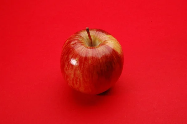 Red Apple Red Background — Stock Photo, Image