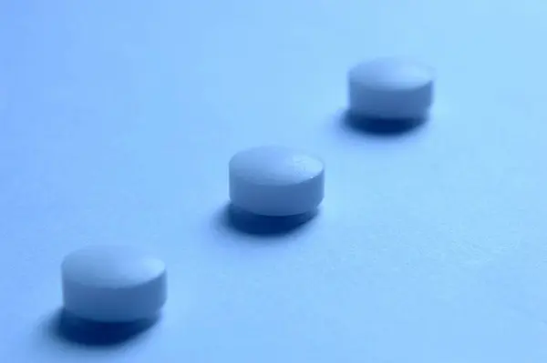 Tabletki Pod Rząd Zbliżenie — Zdjęcie stockowe