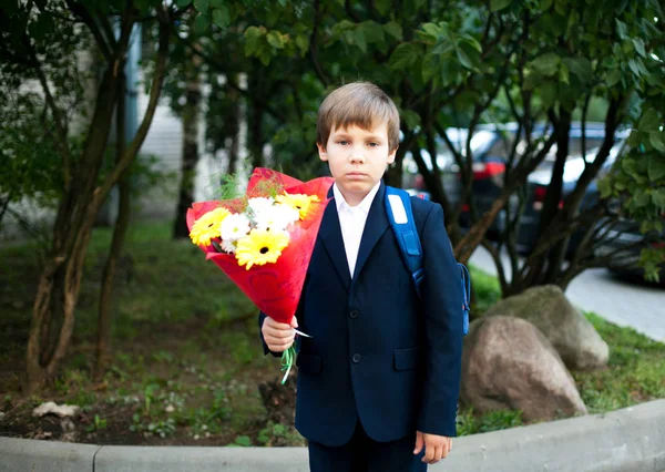 A boy going first time to shool at the first of September