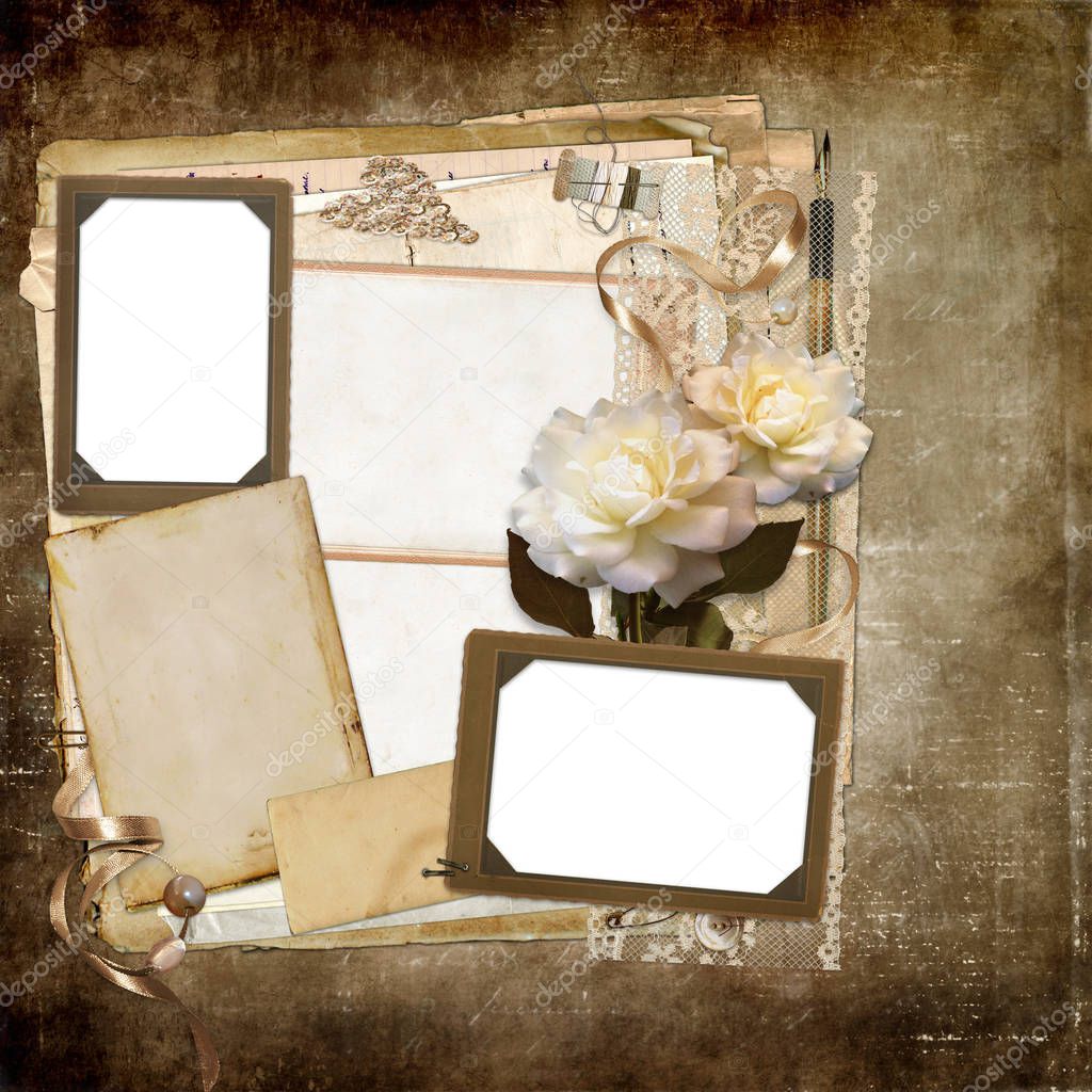 Old vintage photo frames, old cards for text or photo, faded roses, ribbons, vintage jewelry, lace on a worn vintage background