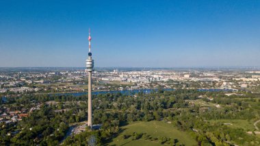 Beautiful drone shot of Viennas Donauturm with a blue sky daytime clipart