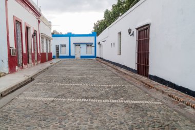 Small cobblestoned street in the center of Bayamo, Cuba clipart