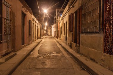 Narrow alley in Camaguey, Cuba clipart