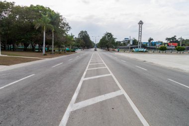 Empty road at Plaza de la Patria (Fatherland Sqaure)  in Bayamo, Cuba clipart