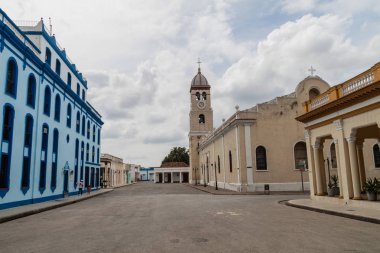 BAYAMO,  CUBA - JAN 30, 2016: San Salvador church at Cespedes square in Bayamo, Cuba clipart