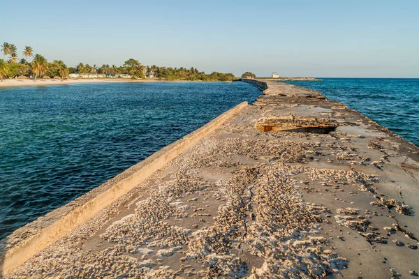 Wave breaker of a beach in Playa Giron village, Cuba.