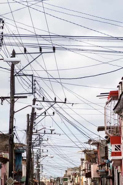 Mess of wires on the street in Camaguey, Cuba