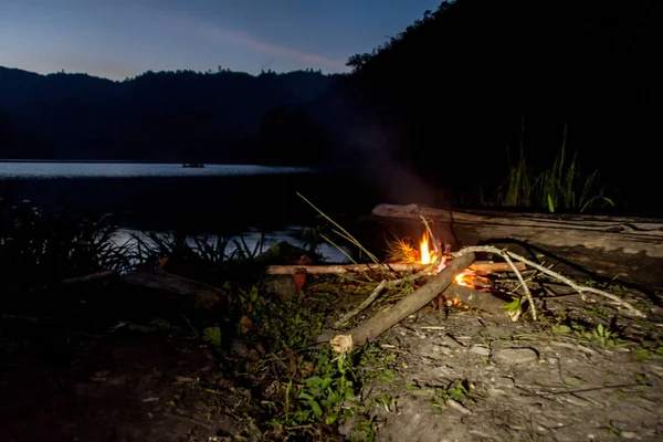 Campfire by Laguna Brava (Yolnabaj) lake, Guatemala