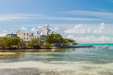 Wooden mansions at Caye Caulker island, Belize clipart