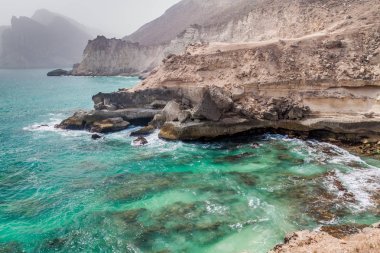 Cliffs at Mughsail, Oman clipart
